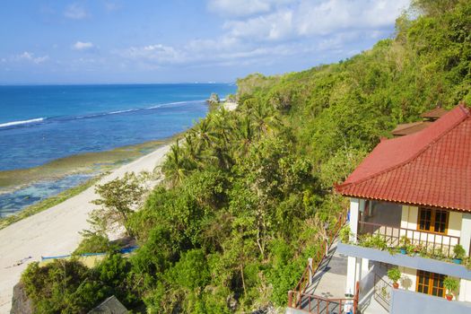 House at tropical beach.