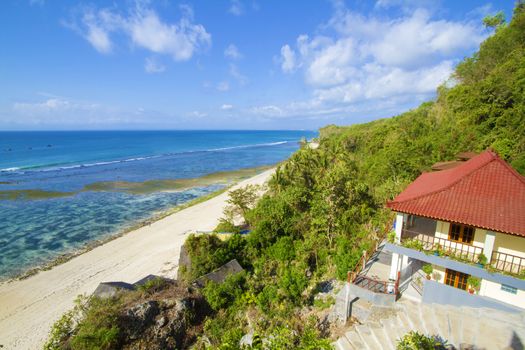 House at tropical beach.