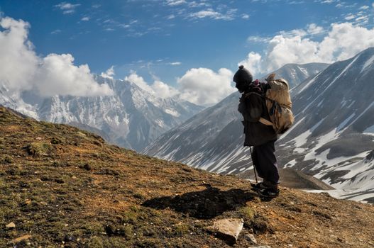 Sherpa in picturesque Himalayas mountains in Nepal