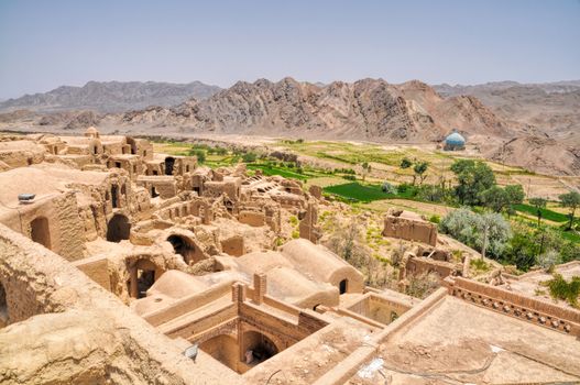 Ruins of old houses in village of Kharanaq in Iran