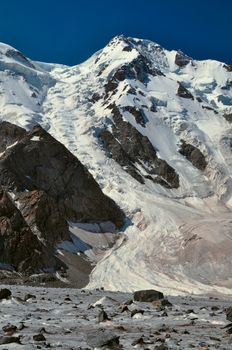 Scenic view of glacier and highest peaks in Tien-Shan mountain range in Kyrgyzstan