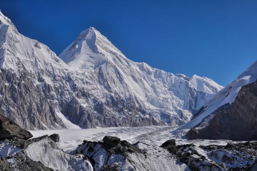 Picturesque view of Engilchek glacier with peaks of Tian Shan mountain range in Kyrgyzstan