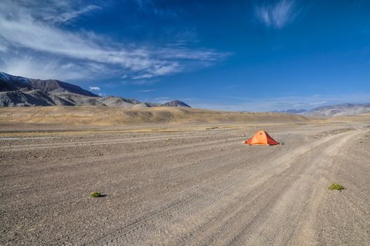 Tent by the road in Pamir mountains in Tajikistan