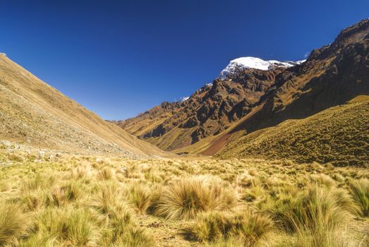 Picturesque valley between high mountain peaks in Peruvian Andes