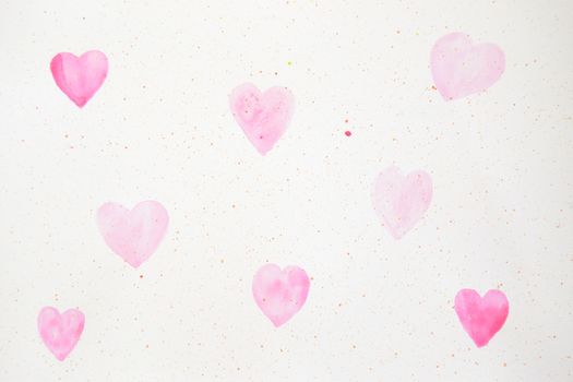 painted pink hearts on a white paper
