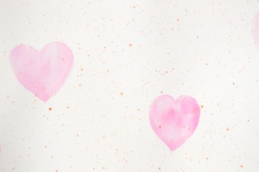 painted pink hearts on a white paper