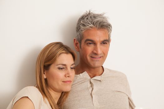 25-30, adult, apartment, attractive, bed, bedroom, caucasian, Couple, fun, handsome, happy, home, horizontal, house, leisure, lifestyle, love, marriage, men, model, nightwear, old, people, person, property, releases, sitting, smile, two, women, years, young