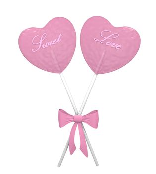 Two pink lollipops heart shaped