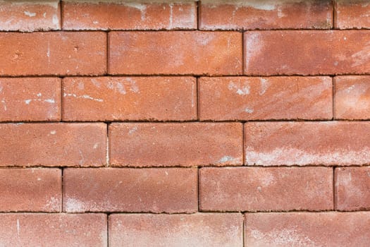 closeup of old red brick wall texture.