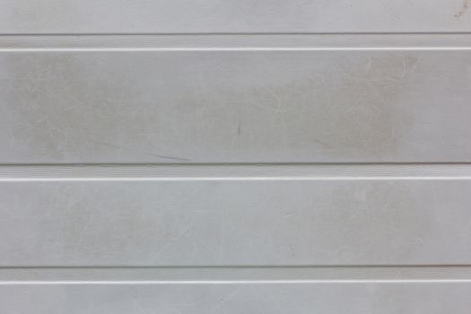 dirty gray wall background or texture with horizontal strips.