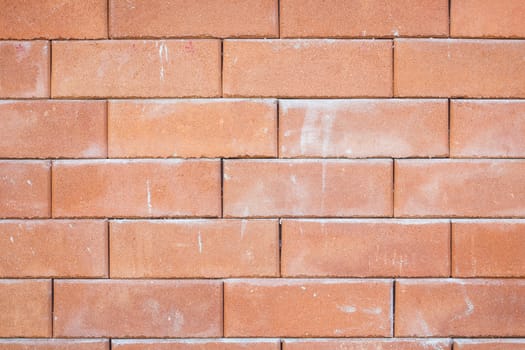 closeup of old red brick wall texture.