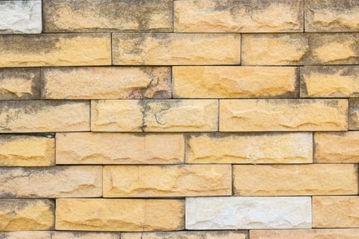 orange grunge brick wall background.