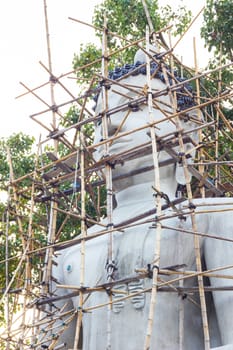 repairing Buddha image in thailand.