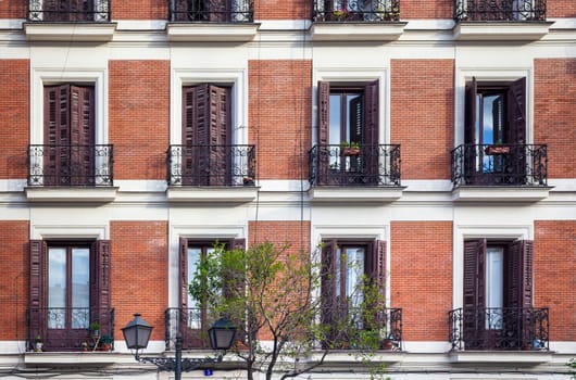 Madrid, Spain - May 6, 2012: Typical building facade on a spring day in Madrid, Spain