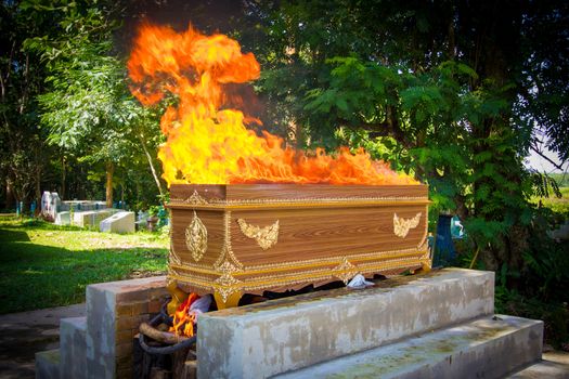 fire on the coffin for cremation, thai tradition