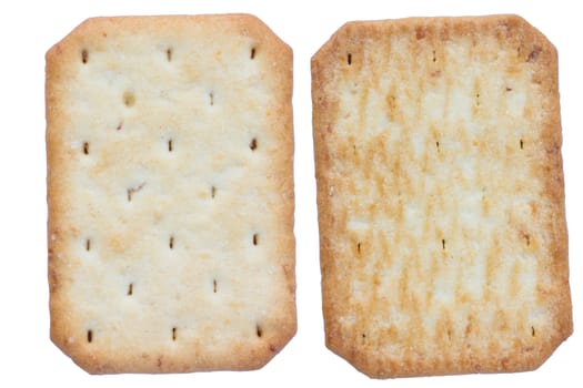 Saltine soda crackers isolated on white background, front and back side.