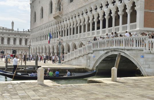 People around the Doge Palace,  built in Venetian Gothic style, and one of the main landmarks of the city of Venice, northern Italy. 