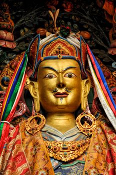 Decorated golden statue of buddhist deity in Nepal