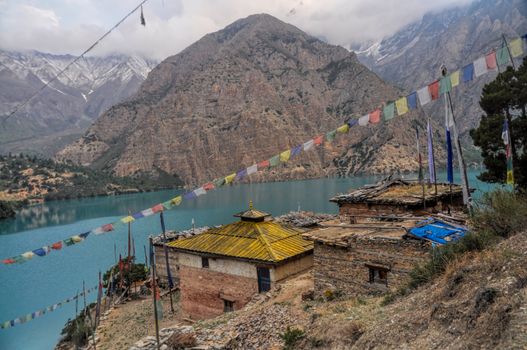 Picturesque old settlement by scenic lake in Dolpo region in Nepal
