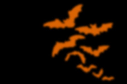 abstract black background with blurred orange line, for halloween. copyspace on the left