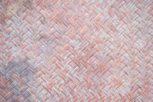 Close up detail view of a wicker basket weave with natural materials and stain fungi, vignette