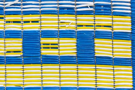 The texture of old and dirty plastic mat for background.