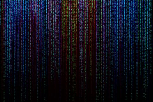 Matrix background with the colorful symbols, motion blur