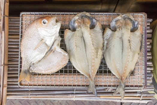 Grilled Fish dried outside the rural store