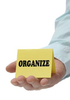 Business man holding organize sign on hand