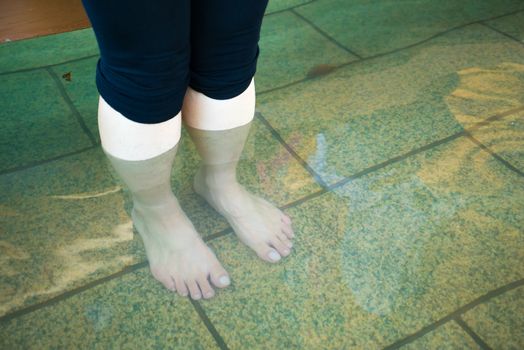 Woman leg taking Foot spa in Hot Spring water boiling, Beppu, Oita, Japan