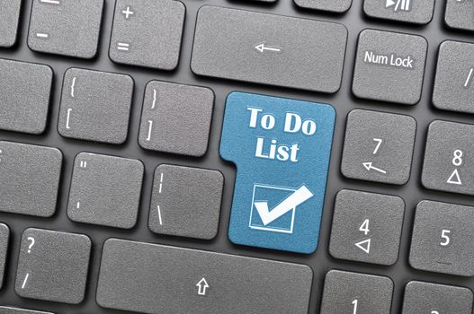 Blue to do list and check mark key on keyboard