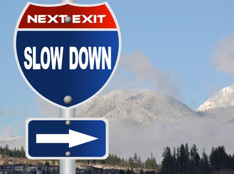Slow down road sign