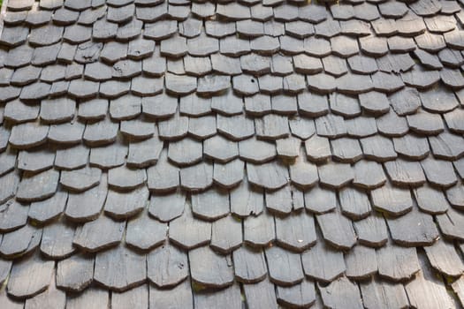 old traditional wooden roof tile of old house.