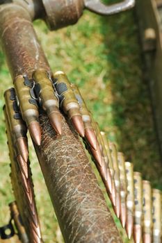 long belt of heavy machine gun bullets