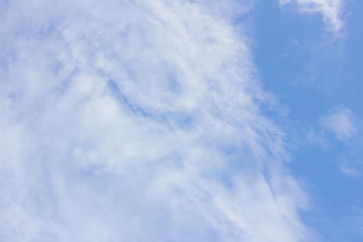 clouds in the wonderful blue sky used as background 