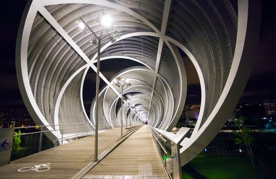 Madrid, Spain - May 5, 2012: Arganzuela Bridge illuminated on a spring night and Madrid Rio Park, Madrid, Spain