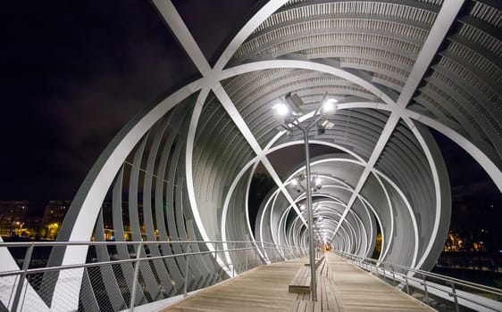 Madrid, Spain - May 5, 2012: Arganzuela Bridge illuminated on a spring night and Madrid Rio Park, Madrid, Spain