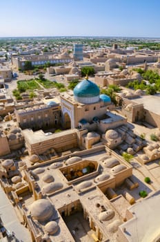 Scenic aerial view of old town in Khiva, Uzbekistan with large mosque