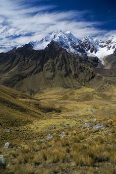 Breathtaking scenery around Alpamayo, one of highest mountain peaks in Peruvian Andes, Cordillera Blanca