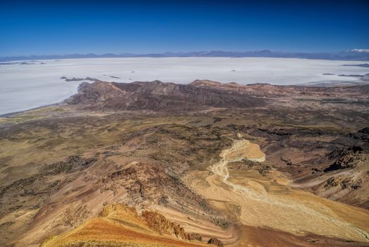 Amazing view of colored mountains and salt plane Salar de Uyuni in Bolivia