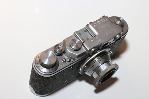 black and metal isolated vintage camera in retro style. 