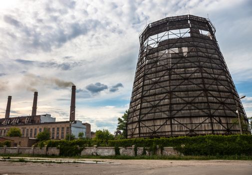 Old and damaged cooling tower of the cogeneration plant in Kyiv, Ukraine.