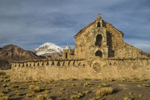 Nevado Sajama, highest peak in Bolivia behing an old church in Sajama national park