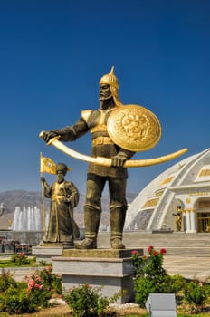 Statues around monument of independence in Ashgabat, capital city of Turkmenistan