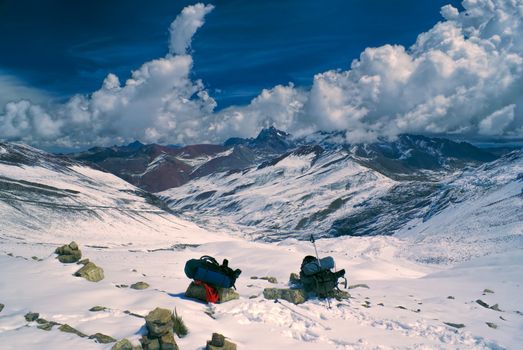 Two backpacks in high altitude south american Andes in Peru, Ausangate