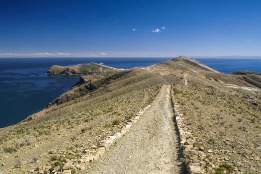 Scenic path on the coast of Isla del Sol, island on lake Titicaca in Bolivia
