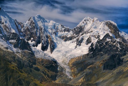 Majestic peaks around Alpamayo, one of highest mountain peaks in Peruvian Andes, Cordillera Blanca