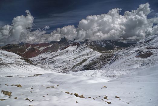 Dramatic clouds above high altitude south american Andes in Peru, Ausangate