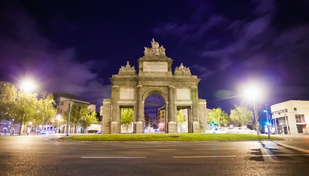 Madrid, Spain - May 8, 2012: Gate of Toledo (Puerta de Toledo) on a  spring night in Madrid, Spain