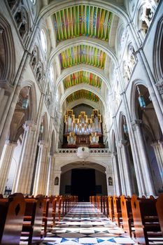 Madrid, Spain - May 6, 2012: Cathedral Almudena interior with view of the pipe organ on a sunny day in Madrid, Spain